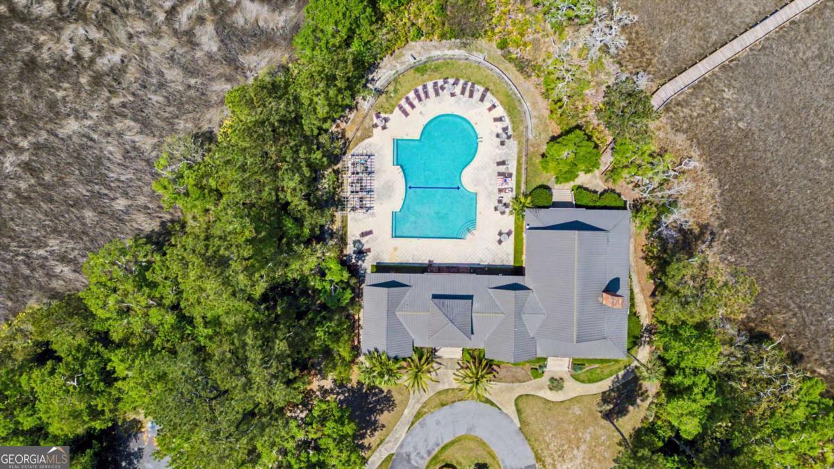 656 Sanderling Trace Waverly, GA 31565 - Photo 50 of 71 an aerial view of a house with a swimming pool
