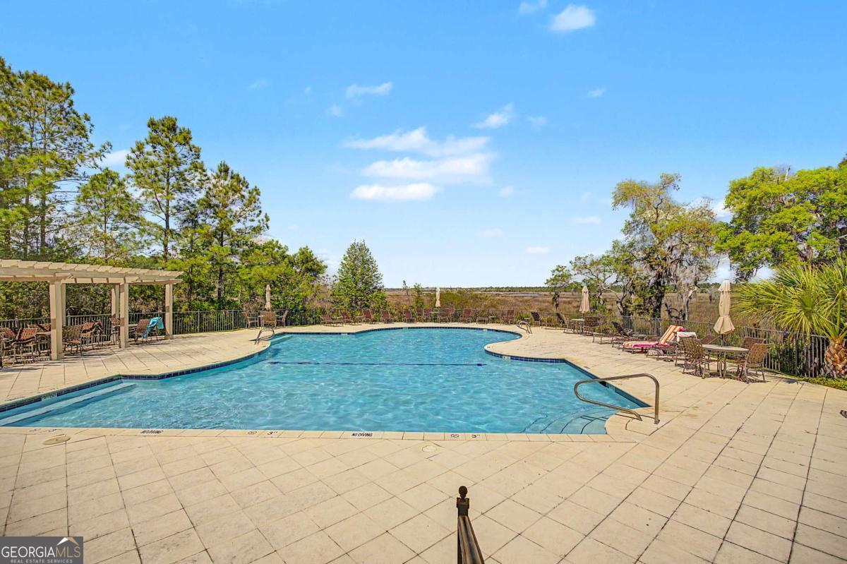 656 Sanderling Trace Waverly, GA 31565 - Photo 52 of 71 a view of a backyard