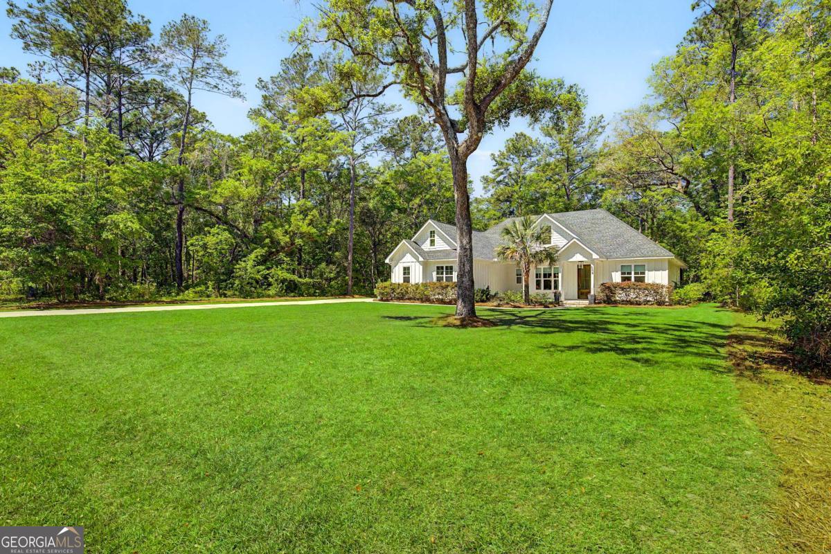 656 Sanderling Trace Waverly, GA 31565 - Photo 65 of 71 a view of house with backyard