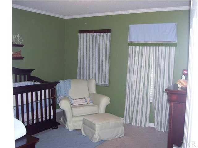 6310 Billoree Road Pace, FL 32571 - Photo 14 of 15 SMALLER OF TWO BEDROOMS WHAT A SWEET NURSERY