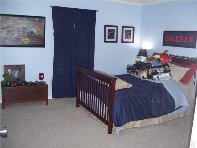 6310 Billoree Road Pace, FL 32571 - Photo 15 of 15 LARGER BEDROOM "BIG ENOUGH FOR A MONSTER TRUCK"