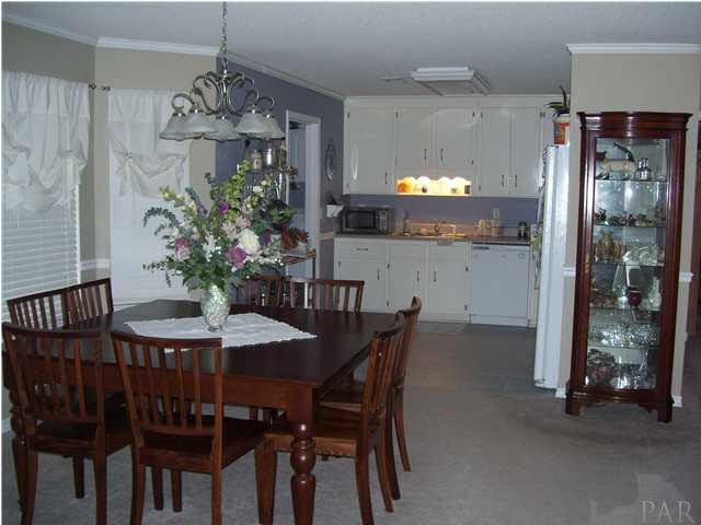 6310 Billoree Road Pace, FL 32571 - Photo 5 of 15 DINING AREA TO KITCHEN
