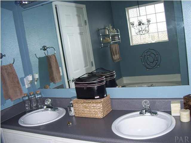 6310 Billoree Road Pace, FL 32571 - Photo 9 of 15 DOUBLE VANITY IN OWNERS BATH HUGE MIRROR