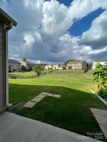 a view of a golf course with a lake