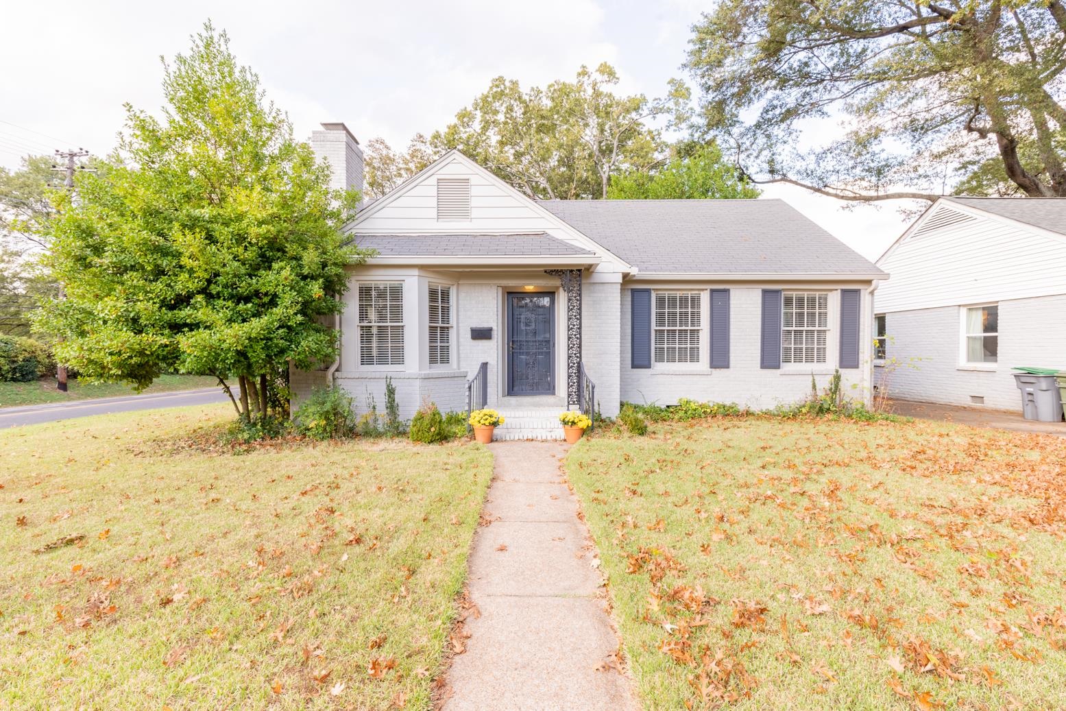 380 Holmes Circle Memphis, TN 38111 - Photo 1 of 22 a view of a house with a large tree with yard