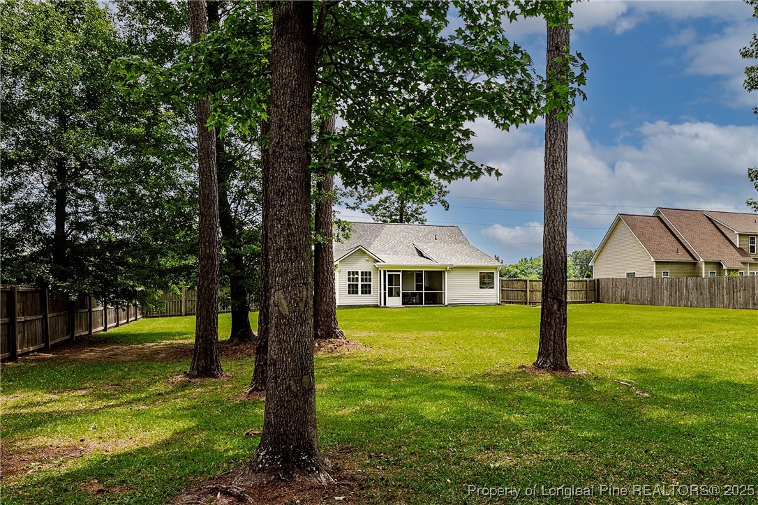 3453 Thrower Road Hope Mills, NC 28348 - Photo 23 of 24 a front view of a house with garden