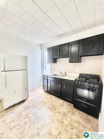 a bedroom with a bed and a cabinets