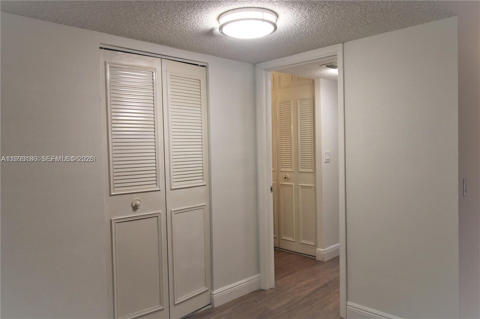 3690 Inverrary Drive, Unit 3A Lauderhill, FL 33319 - Photo 6 of 18 a view of a bathroom with wooden floor