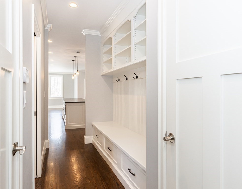 16 Jonathan Lane Bedford, MA 01730 - Photo 17 of 42 a bathroom with a double vanity sink and mirror