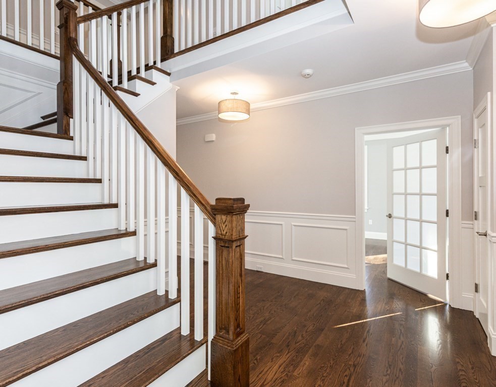 16 Jonathan Lane Bedford, MA 01730 - Photo 6 of 42 a view of entryway with wooden floor