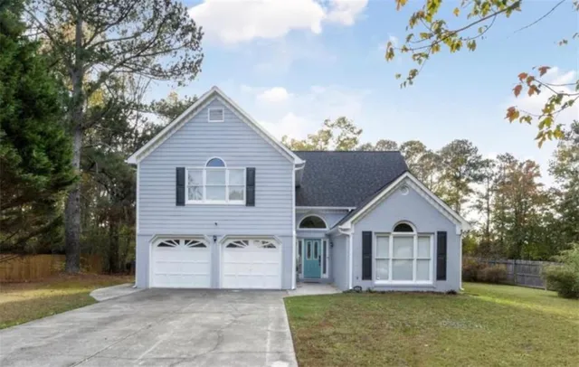 front view of house with a yard