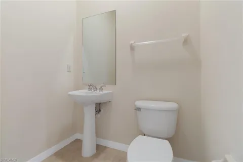 a view of a room with balcony and windows