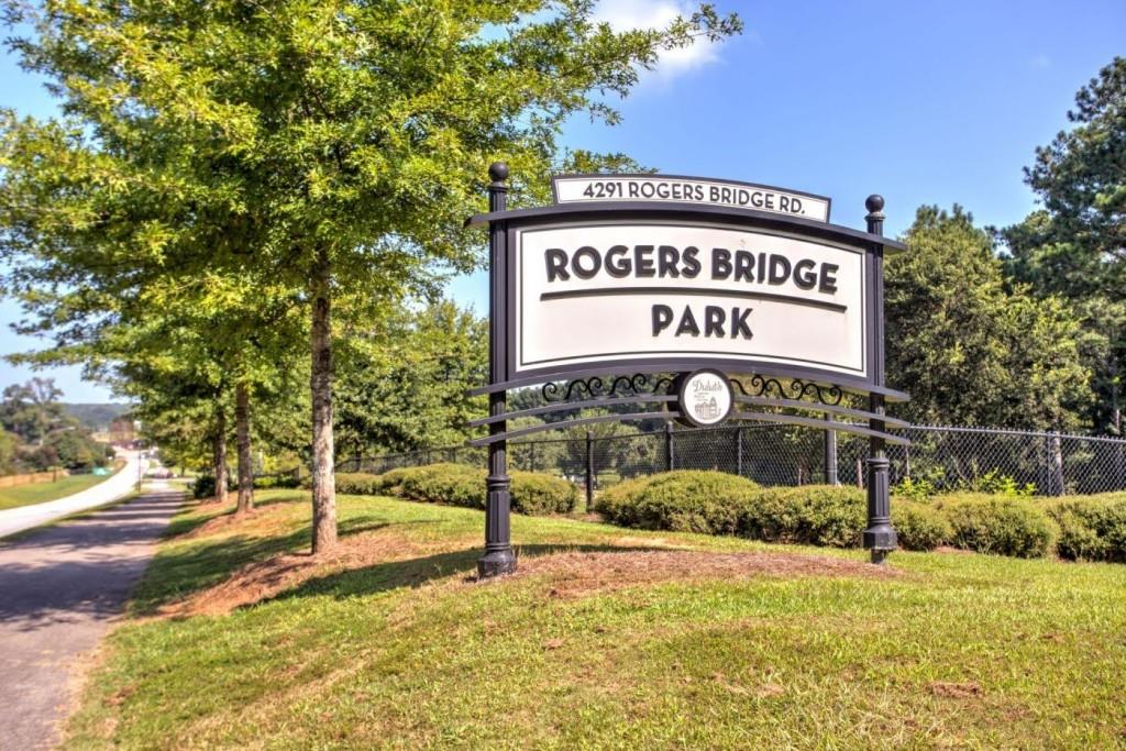 4240 Cavalier Way Duluth, GA 30097 - Photo 44 of 46 a sign board on the side of a road