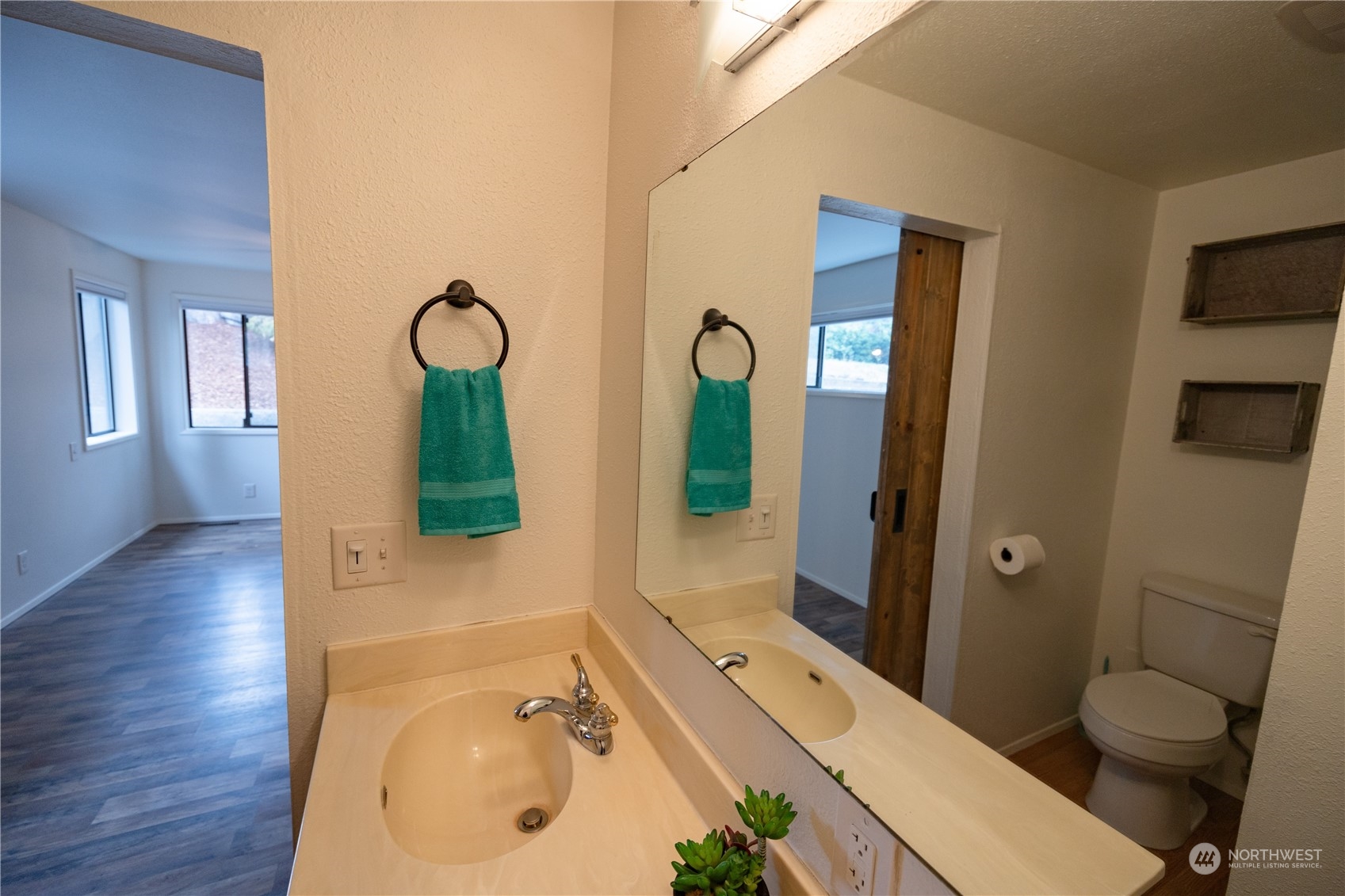 129 Del Monte Avenue Fircrest, WA 98466 - Photo 17 of 38 a bathroom with a granite countertop sink toilet and shower