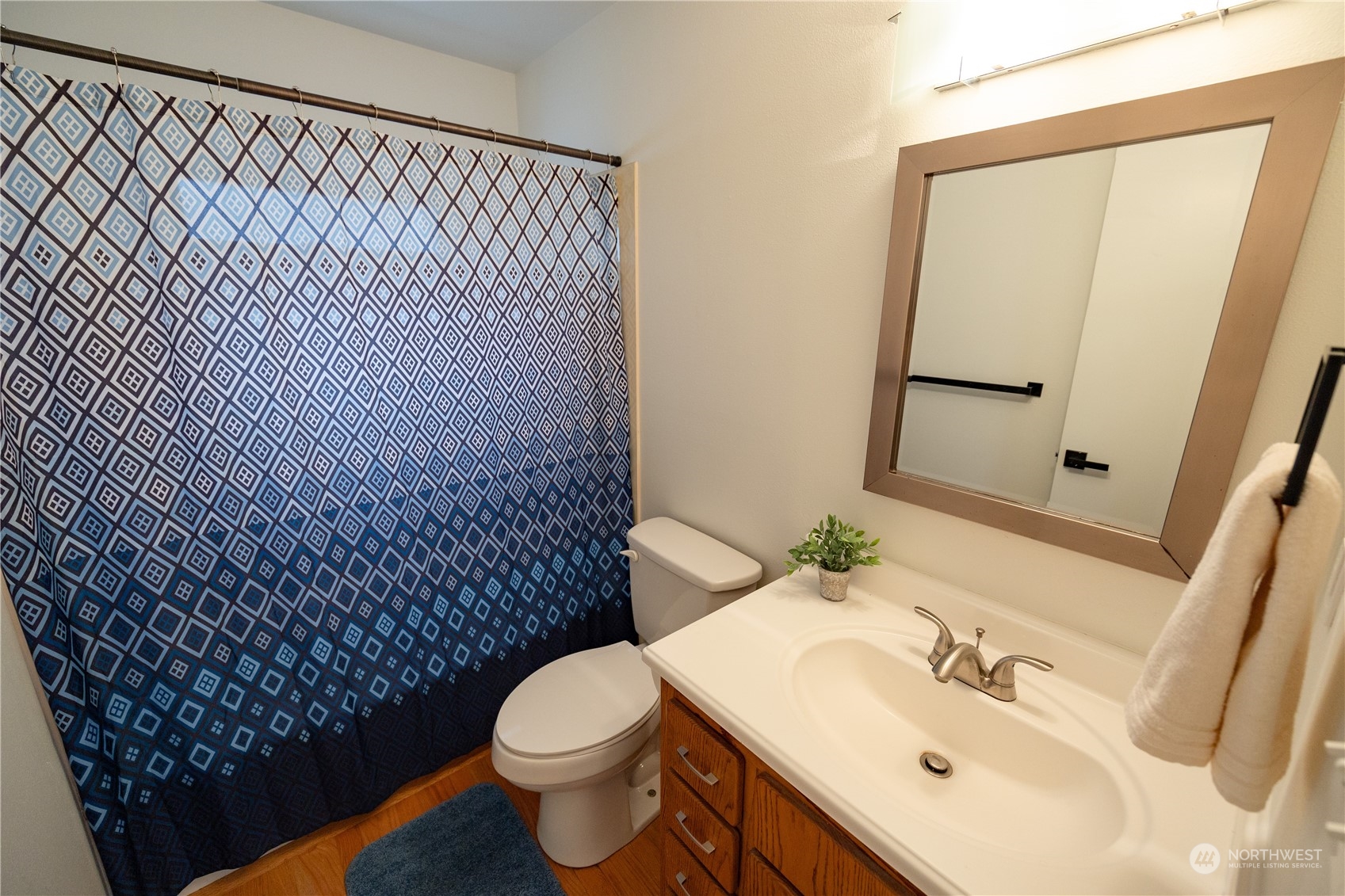 129 Del Monte Avenue Fircrest, WA 98466 - Photo 22 of 38 a bathroom with a sink and a toilet