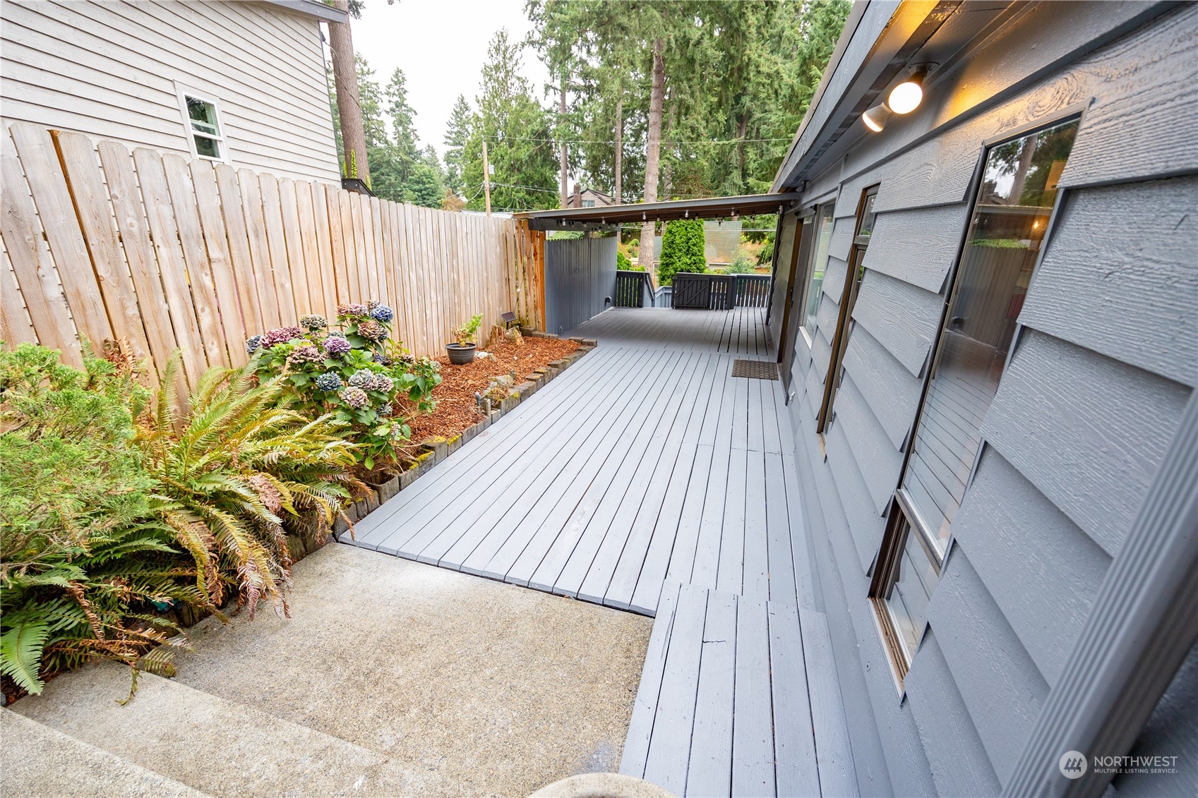 129 Del Monte Avenue Fircrest, WA 98466 - Photo 28 of 38 a view of outdoor space with deck and furniture