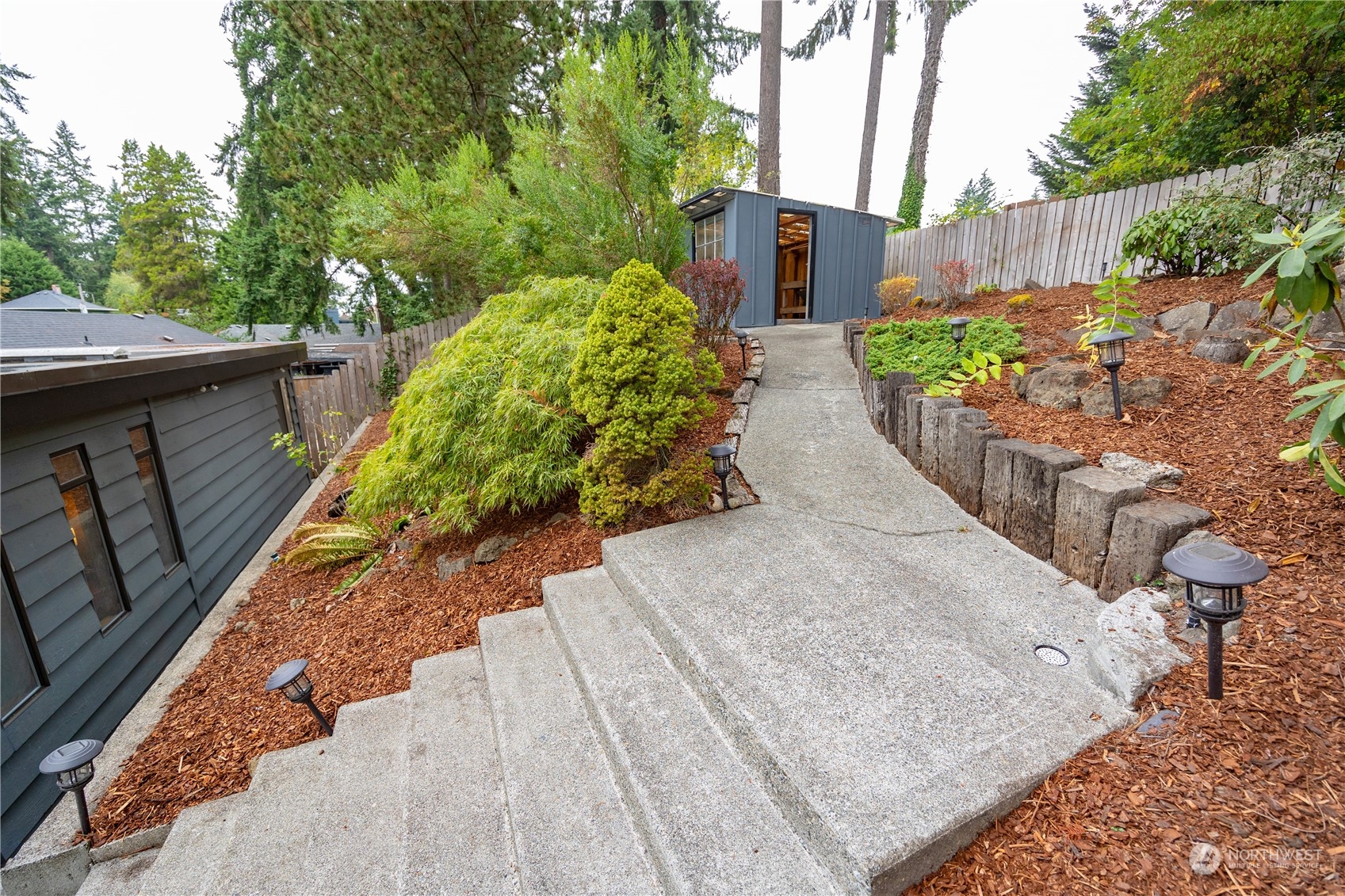 129 Del Monte Avenue Fircrest, WA 98466 - Photo 32 of 38 a view of a garden with pathway