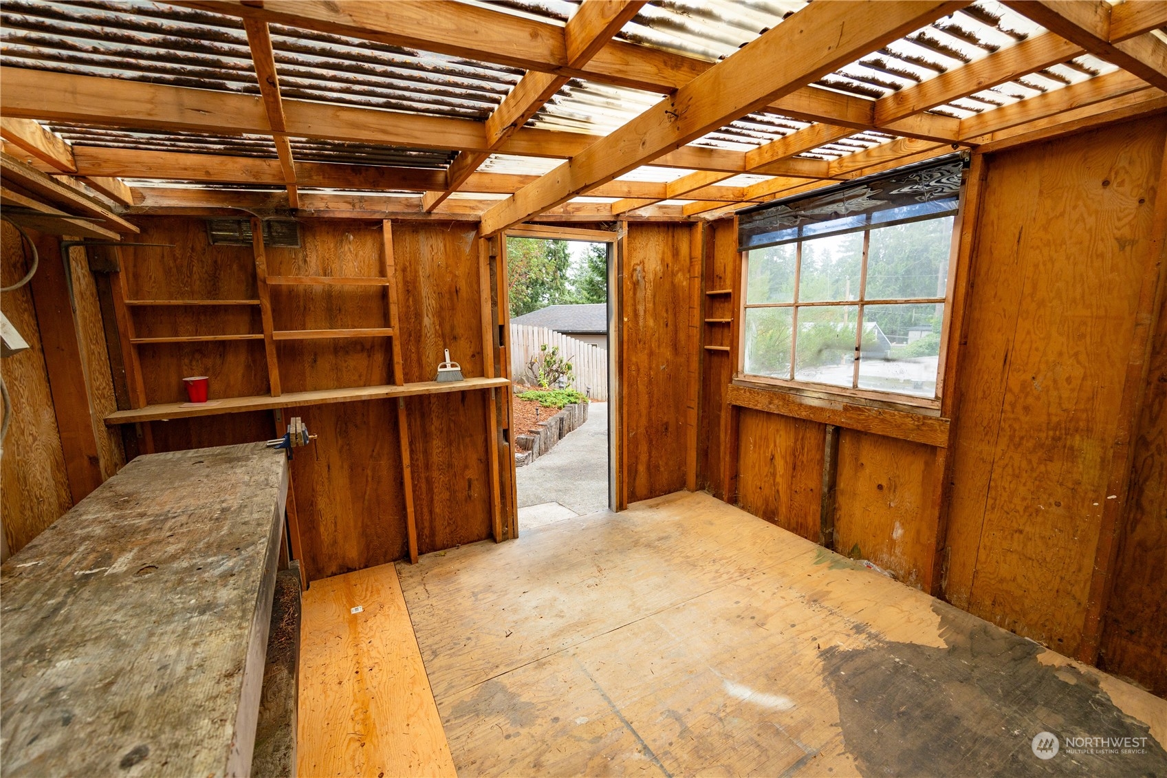 129 Del Monte Avenue Fircrest, WA 98466 - Photo 34 of 38 a bed room with a bed and a window