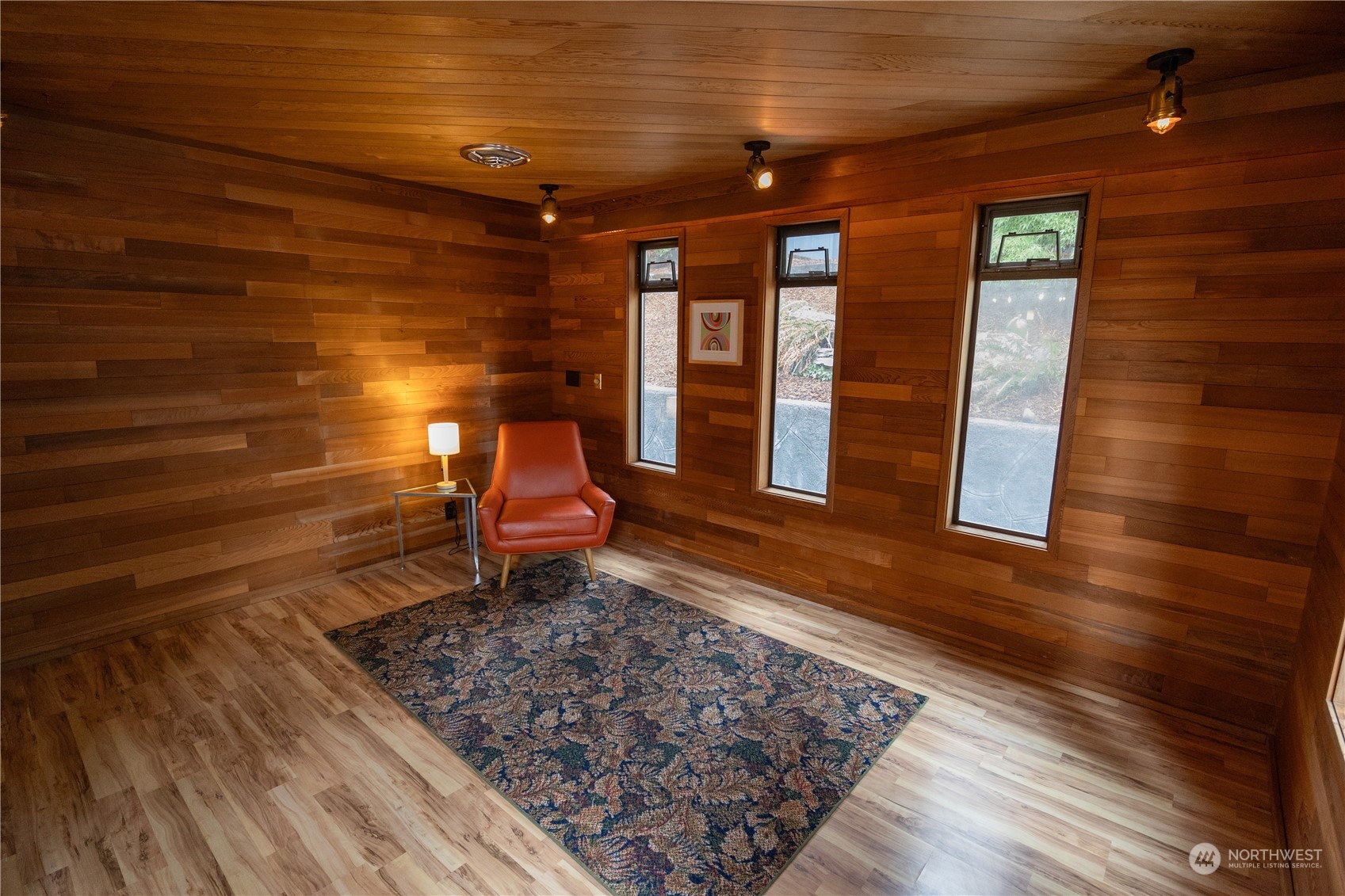 129 Del Monte Avenue Fircrest, WA 98466 - Photo 5 of 38 a view of a room with wooden floor and furniture