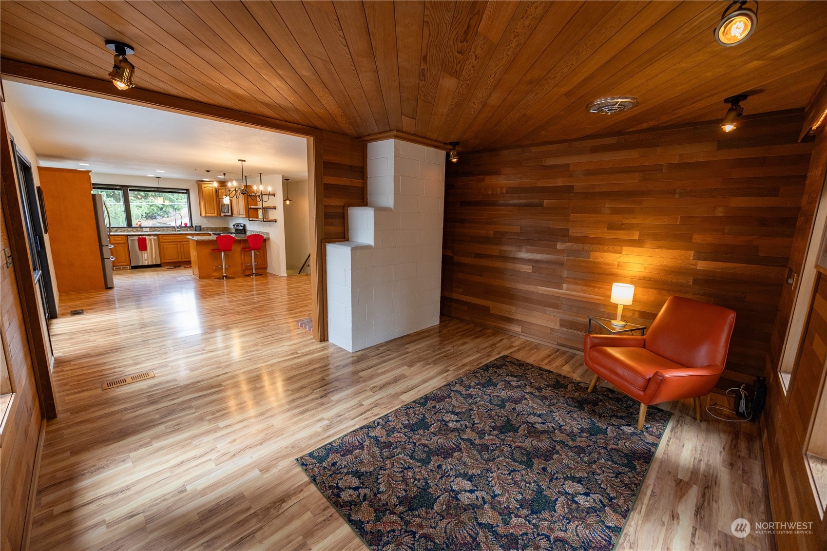 129 Del Monte Avenue Fircrest, WA 98466 - Photo 6 of 38 a lobby with furniture and wooden floor