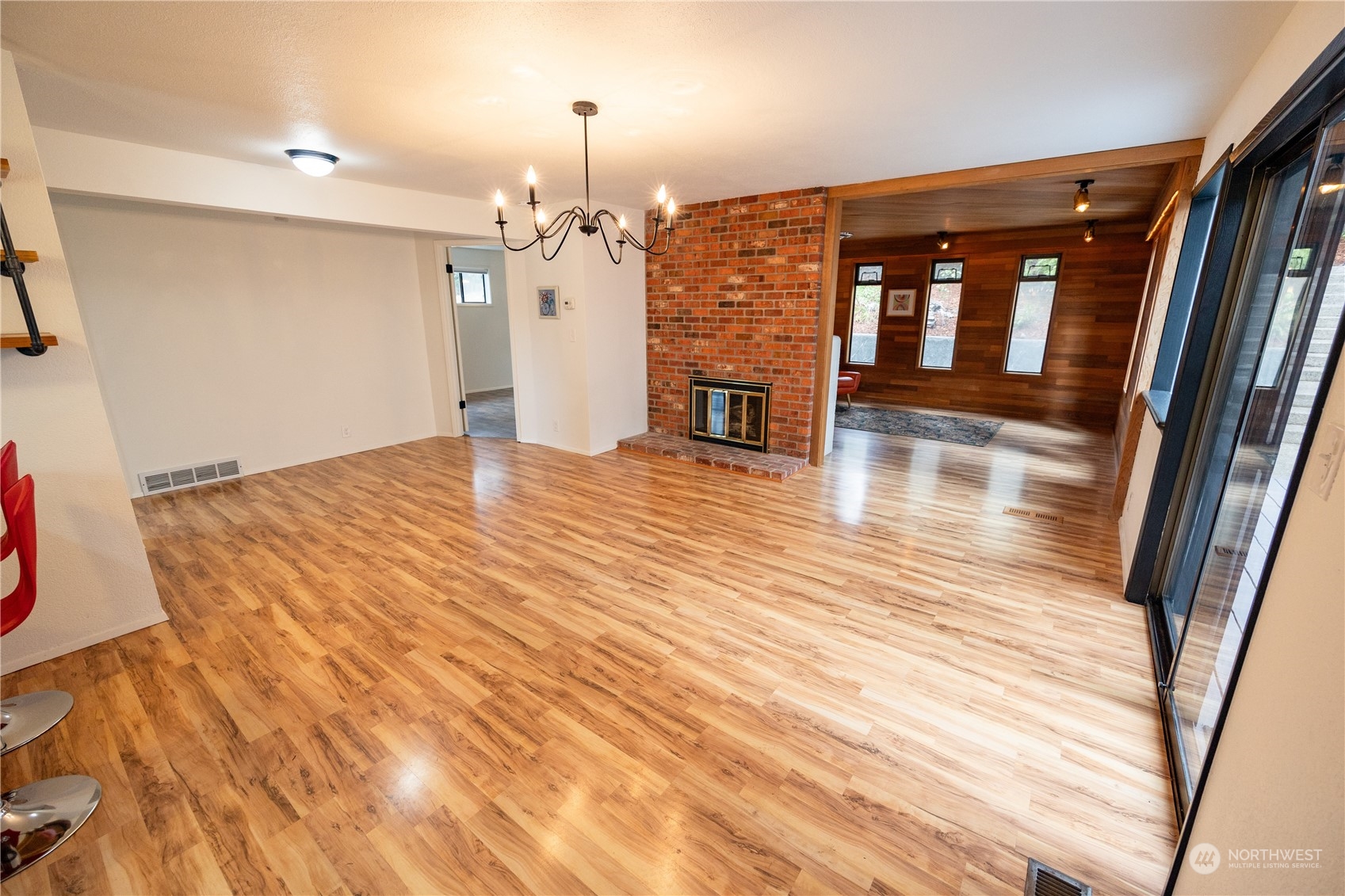 129 Del Monte Avenue Fircrest, WA 98466 - Photo 7 of 38 a view of a livingroom with wooden floor and staircase