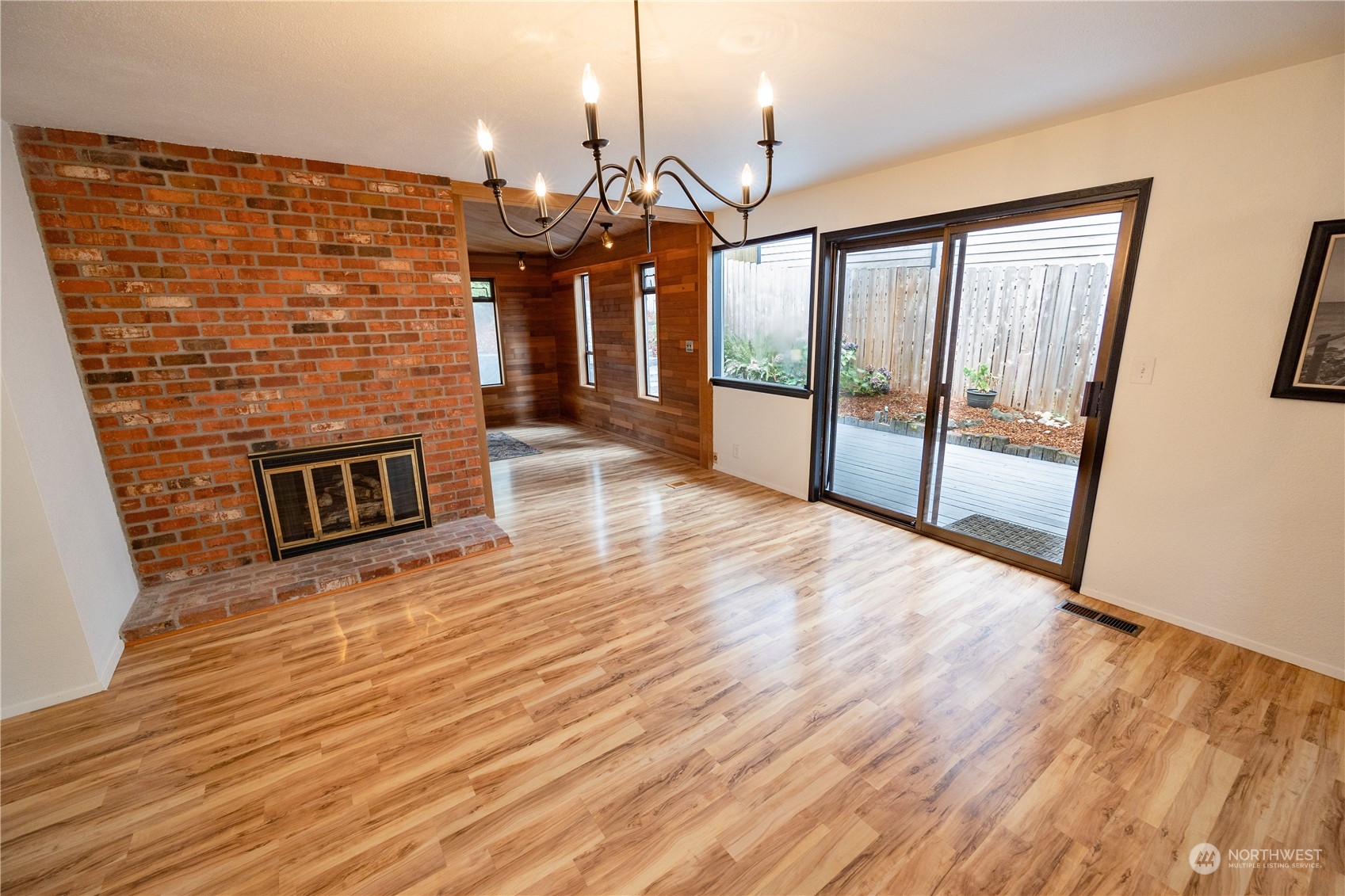 129 Del Monte Avenue Fircrest, WA 98466 - Photo 8 of 38 a view of a living room hardwood floor and a ceiling fan