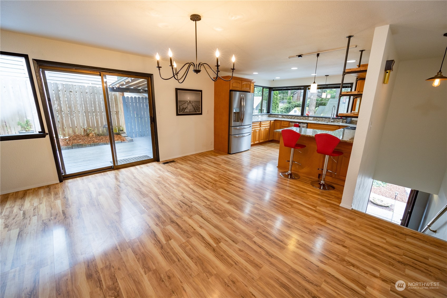129 Del Monte Avenue Fircrest, WA 98466 - Photo 9 of 38 a view of a living room and hardwood floor