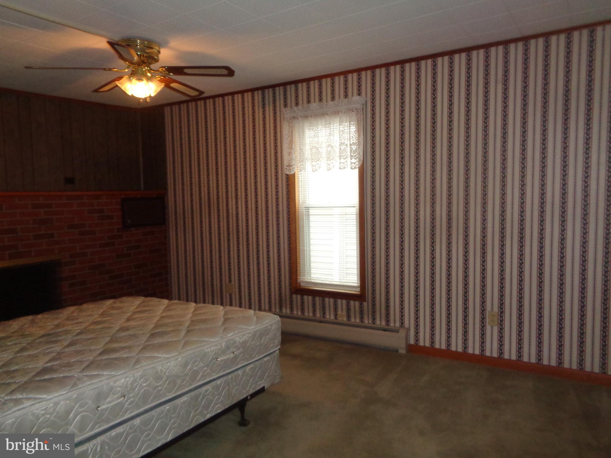 4 Waterfront Street Reedsville, PA 17084 - Photo 9 of 27 Family room/Bed will be removed