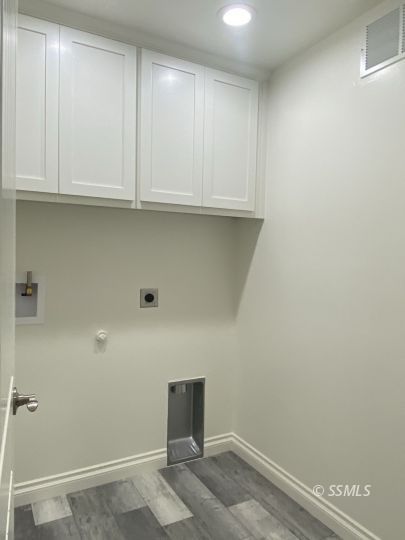 1521 Mayo Street Ridgecrest, CA 93555 - Photo 9 of 24 a view of small space with wooden floor