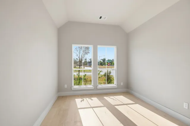 an empty room with windows