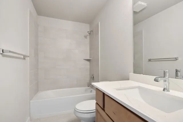 an empty room with a bathroom