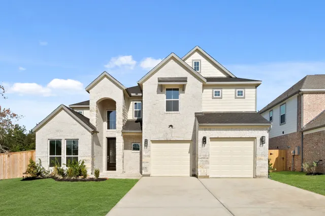 a sign that is sitting in the grass