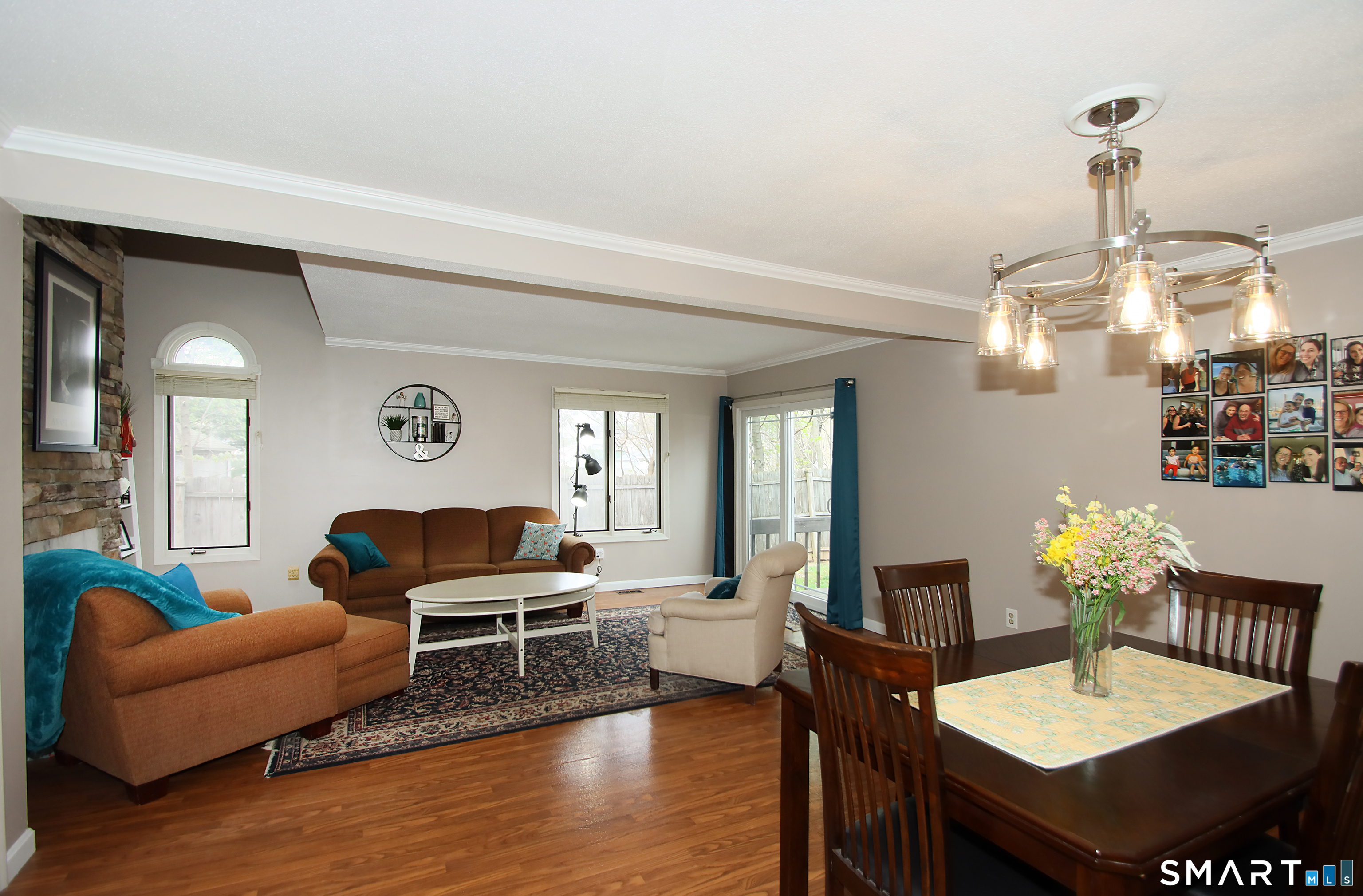 182 Main Street, Unit A Manchester, CT 06042 - Photo 34 of 34 View of Dining Room, Living Room, Slider to Deck. Open Floor Plan.