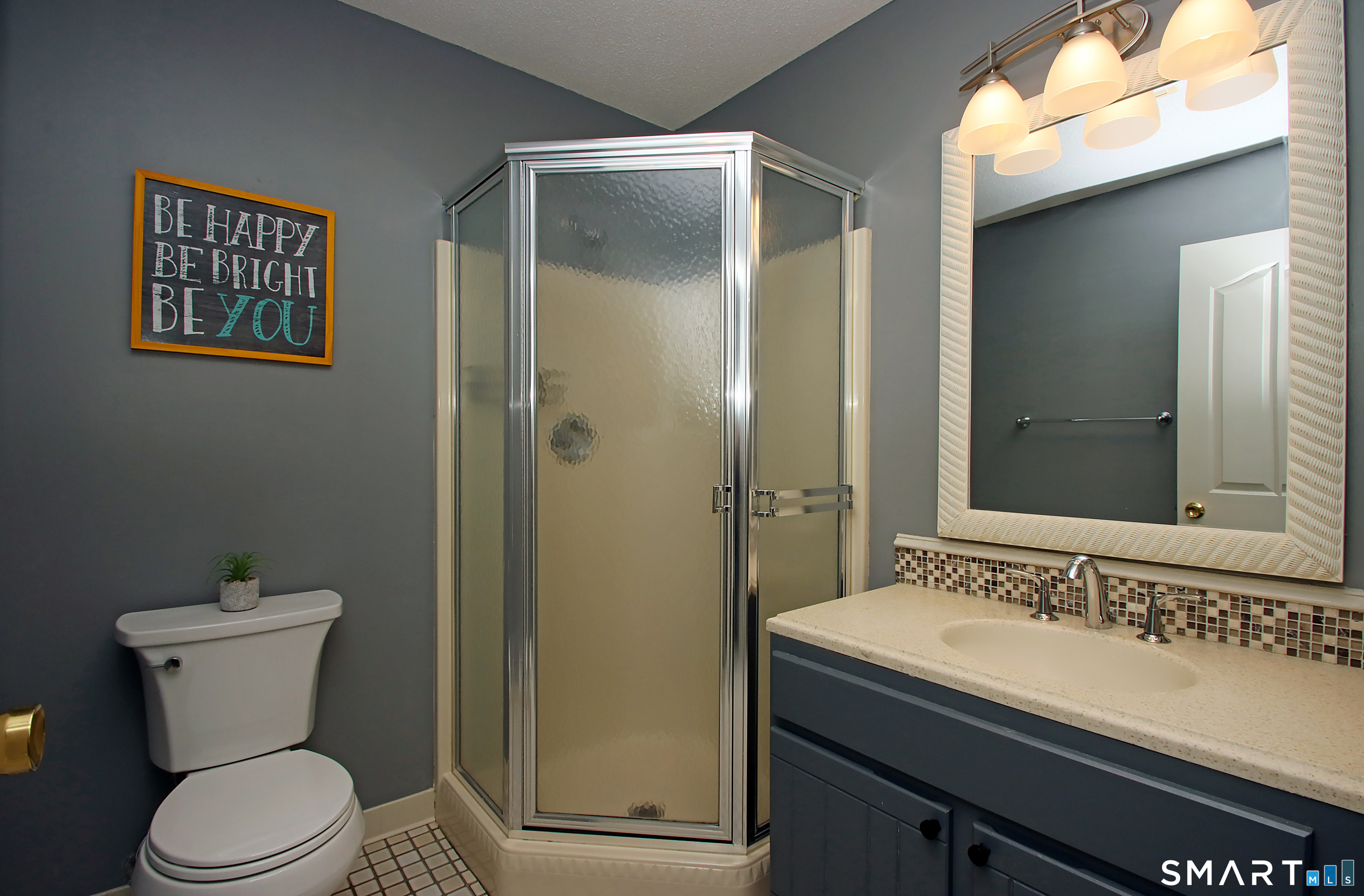 182 Main Street, Unit A Manchester, CT 06042 - Photo 22 of 34 Second floor full bath with corner shower.