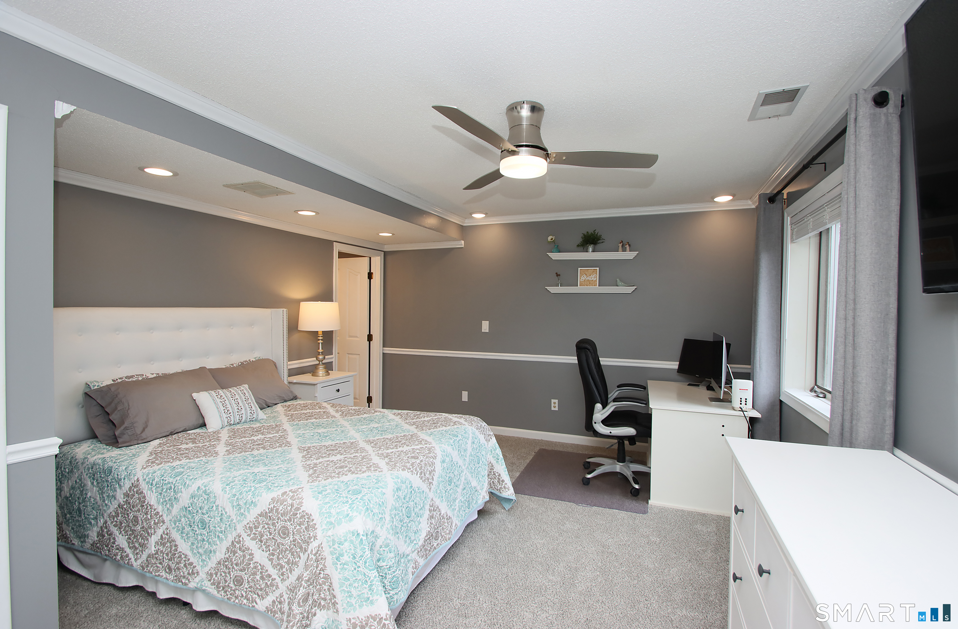 182 Main Street, Unit A Manchester, CT 06042 - Photo 23 of 34 Second floor primary bedroom with new carpet and full bath.