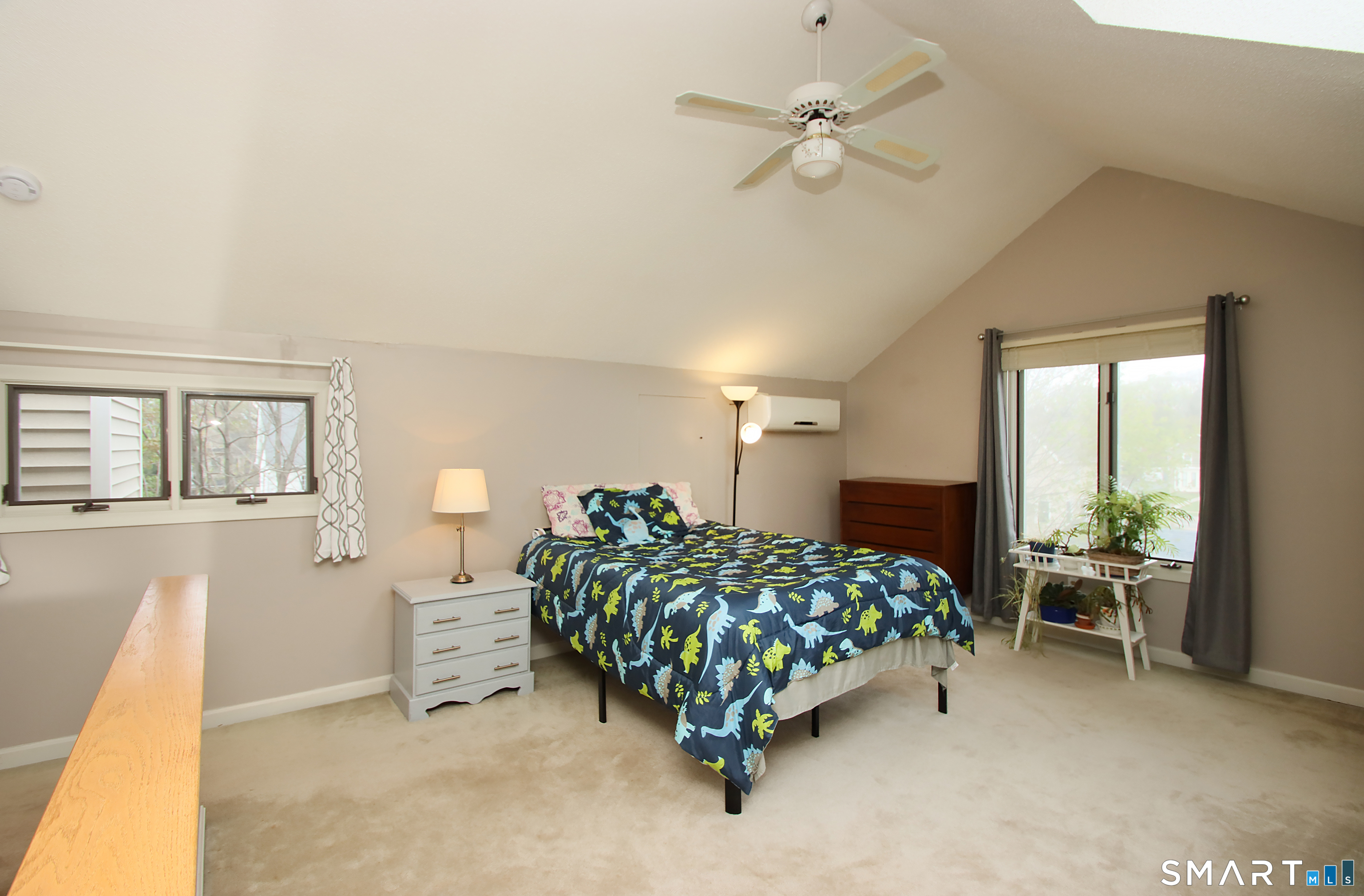 182 Main Street, Unit A Manchester, CT 06042 - Photo 29 of 34 Large Room could be office, family room. Skylight and split system for additional heat and Air conditioning.