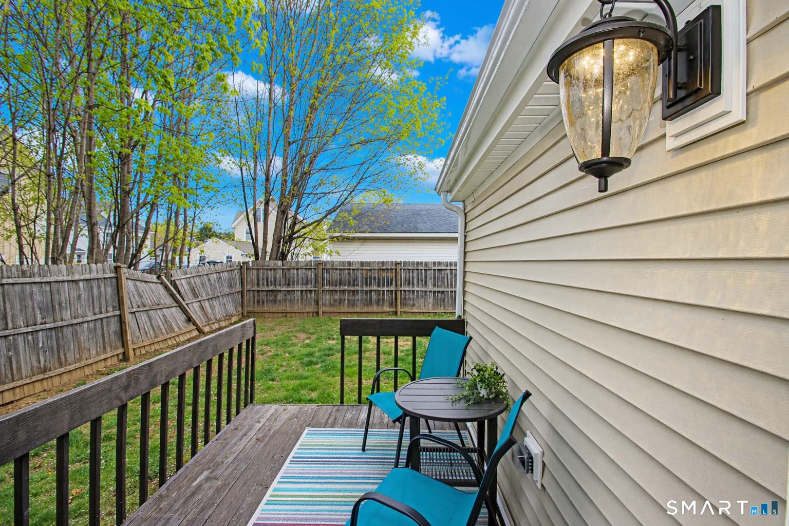 182 Main Street, Unit A Manchester, CT 06042 - Photo 4 of 34 Slider to private back deck and fenced yard.
