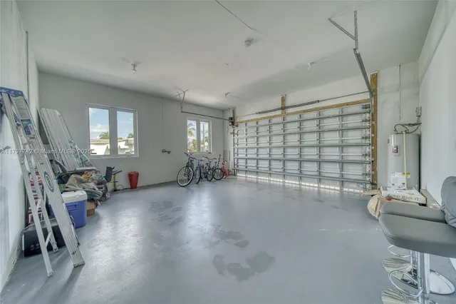 a view of livingroom with hardwood floor and windows