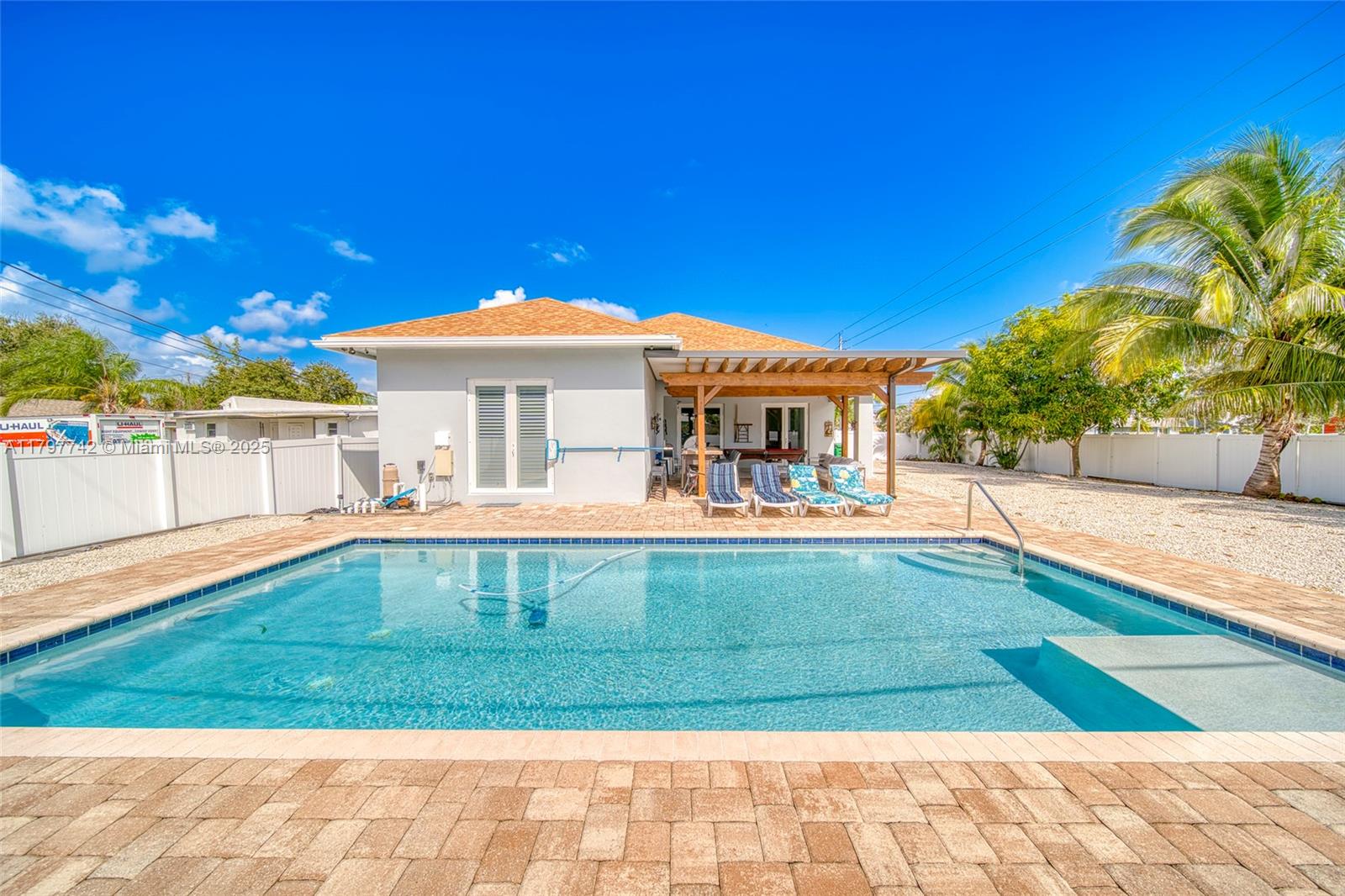 207 Southwest 11th Street Dania Beach, FL 33004 - Photo 4 of 37 a view of a house with swimming pool