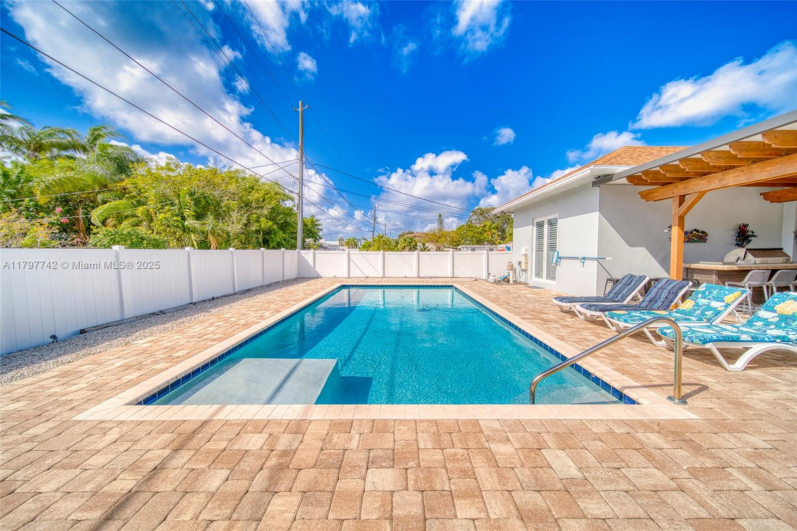 207 Southwest 11th Street Dania Beach, FL 33004 - Photo 6 of 37 a view of a backyard with swimming pool