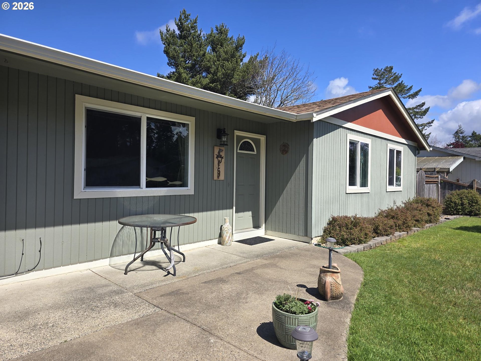 1265 34th Place Florence, OR 97439 - Photo 3 of 29 a view of outdoor kitchen and seating space