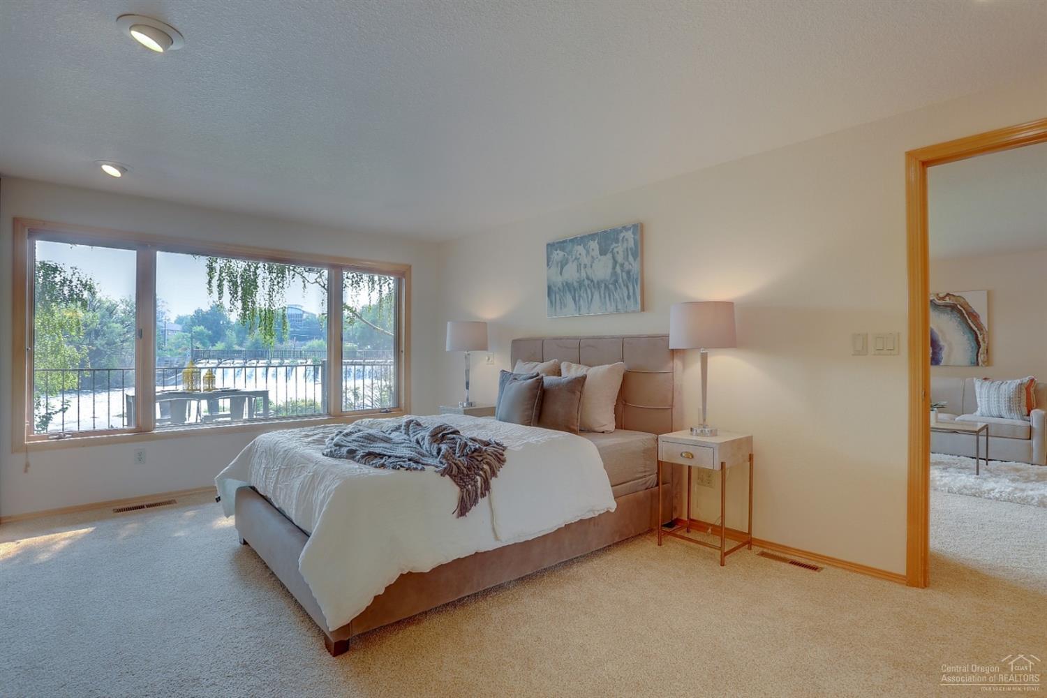 1414 Northwest Awbrey Road, Unit 1 Bend, OR 97703 - Photo 11 of 25 Large master bedroom with impressive vie