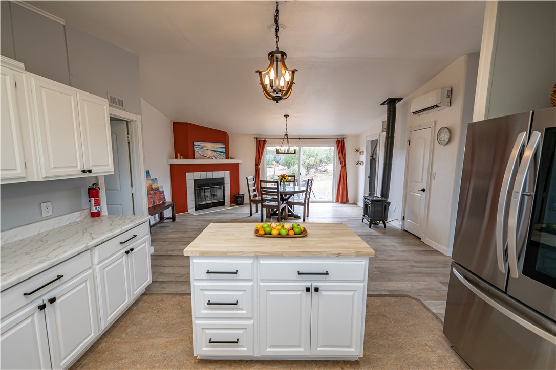 2765 North Silver Springs Road Kingman, AZ 86401 - Photo 49 of 60 a kitchen with a refrigerator and a sink