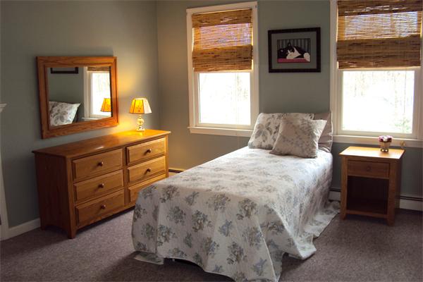55 Edgewood Road Southborough, MA 01772 - Photo 13 of 18 a bedroom with a bed and a dresser in it
