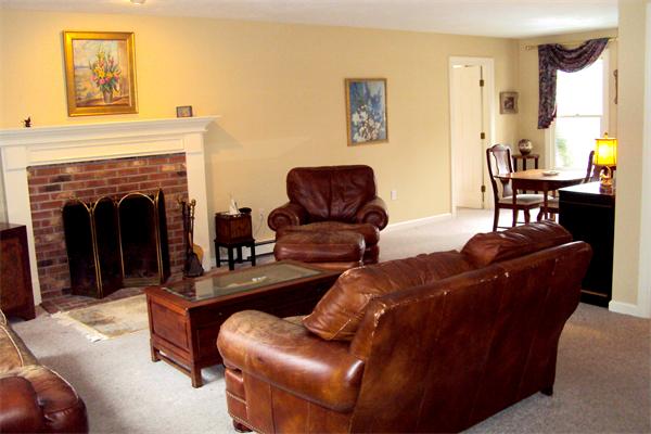 55 Edgewood Road Southborough, MA 01772 - Photo 4 of 18 a living room with furniture and a fireplace