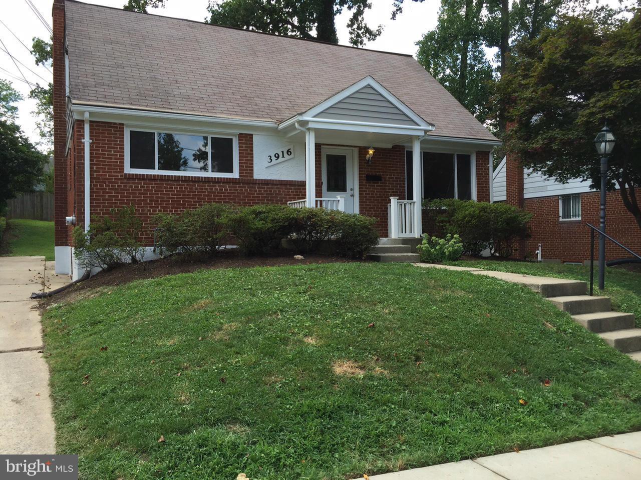 3916 Weller Road Silver Spring, MD 20906 - Photo 1 of 19 a front view of a house with a yard and plants
