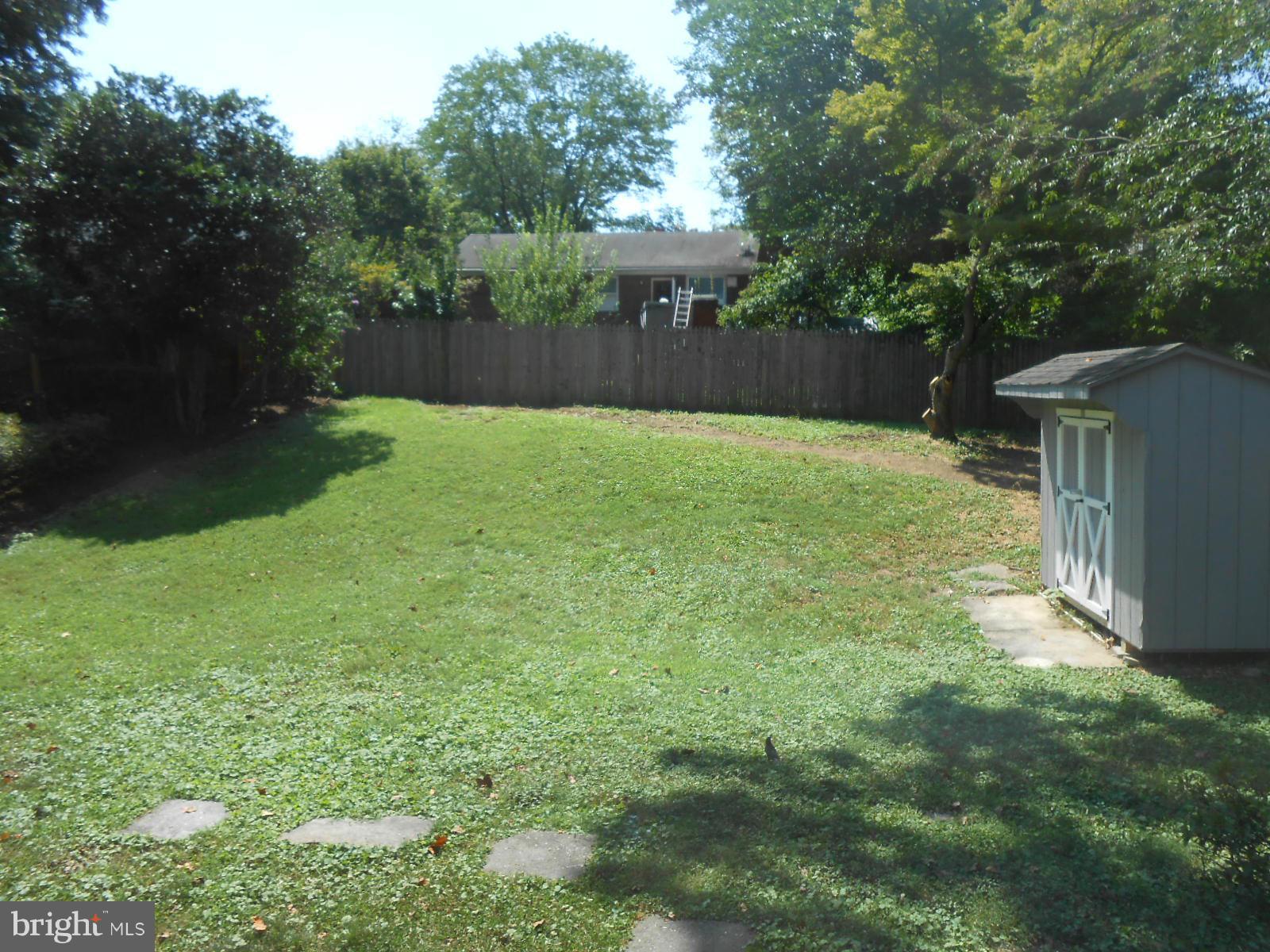 3916 Weller Road Silver Spring, MD 20906 - Photo 2 of 19 a backyard of a house with lots of green space