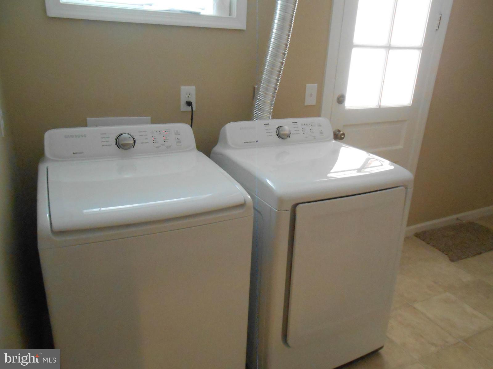 3916 Weller Road Silver Spring, MD 20906 - Photo 18 of 19 a utility room with dryer and washer