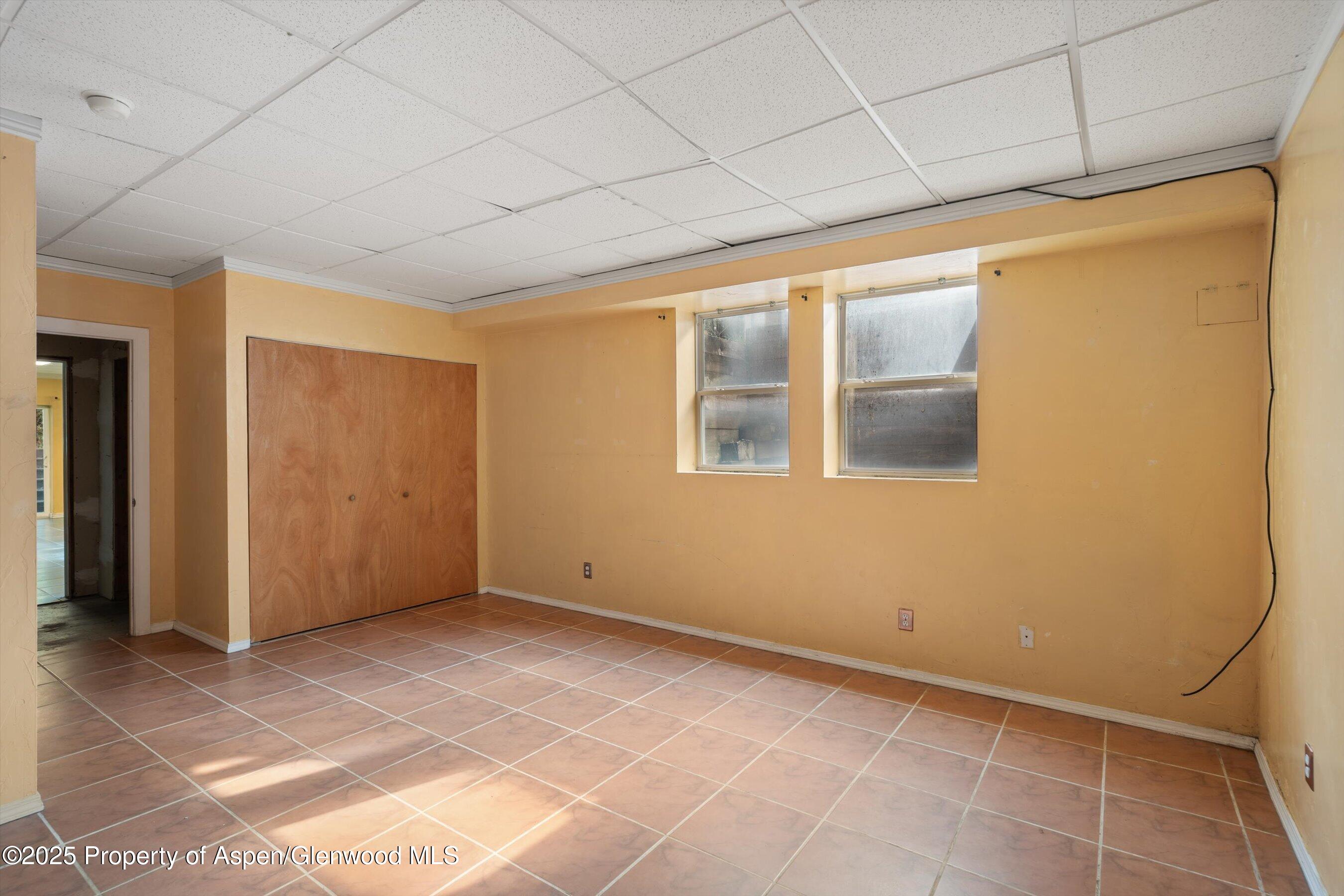 111 Ridge Trail Aspen, CO 81611 - Photo 22 of 37 a view of an empty room with a window