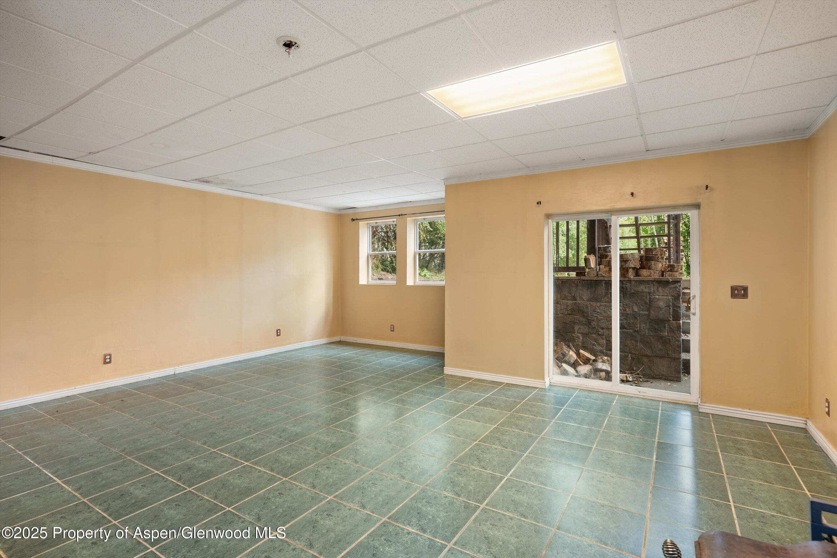 111 Ridge Trail Aspen, CO 81611 - Photo 26 of 37 a view of an empty room with a window